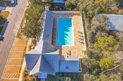 an overhead view of a house with a swimming pool at Sleek beach-themed retreat with patio bikes LSV & pool access in Inlet Beach