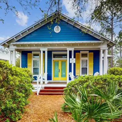 Colorful house near the beach with shared swimming pool