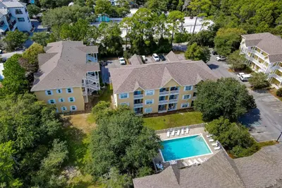 an overhead view of a building with a swimming pool at Comfortable coastal house with roomy accommodations and easy shoreline access in Santa Rosa Beach