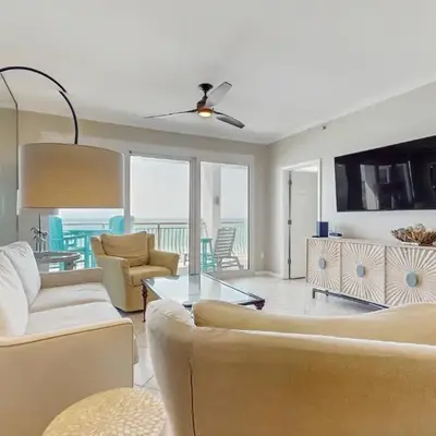 Open-concept beachfront home with balcony lagoon pool beach access pickleball