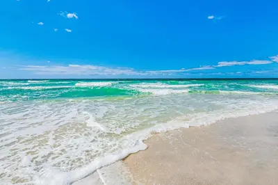 a view of the ocean from the beach at Lavish High Pointe condo with resort pool amazing ocean view & pickleball in Seacrest