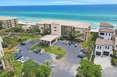an aerial view of a parking lot at a resort at Gulf front condo with beach access pool hot tub tennis & pickleball in Seacrest
