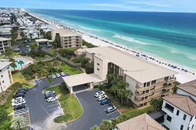 an aerial view of the beach and the ocean at Gulf front condo with beach access pool hot tub tennis & pickleball in Seacrest