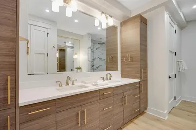 a bathroom with a sink and a mirror at Luxuriously renovated condo with Gulf views beach access pool & hot tub in Inlet Beach