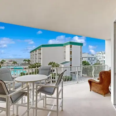 Beach-view condo with outdoor pool hot tub sauna tennis BBQ & beach access