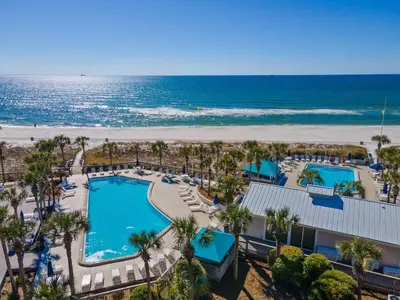 an aerial view of a resort with a pool and the beach at Dunes of Panama E1702 - Sunrise & Sea Breezes in Panama City Beach