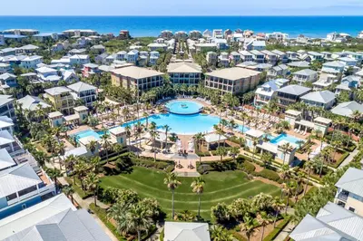 an aerial view of a resort with a pool and the ocean at Seacrest Beach - 3 BR, Bikes, Pool & Beach in Rosemary Beach