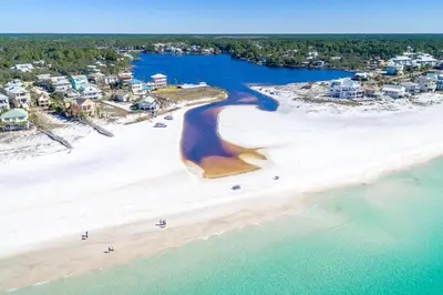 an aerial view of a beach with houses and condos at New Kululu EAST - 3 BR Short walk to the beach, heated pool, Sleeps 12 in Santa Rosa Beach