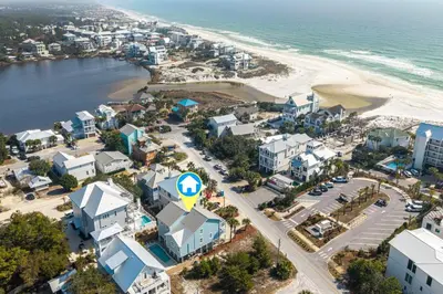 an aerial view of a city and the beach at New Kululu EAST - 3 BR Short walk to the beach, heated pool, Sleeps 12 in Santa Rosa Beach
