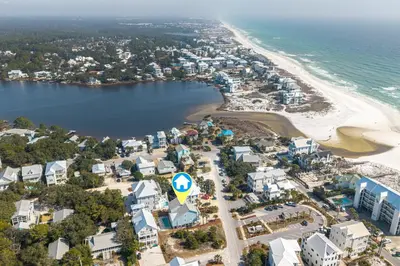 an aerial view of a beach and buildings at New Kululu EAST - 3 BR Short walk to the beach, heated pool, Sleeps 12 in Santa Rosa Beach