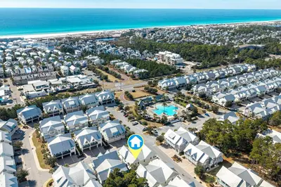 an aerial view of a resort near the beach at Prominence- 3 BR, steps to the resort style pool, Big Chill & Bikes in Santa Rosa Beach