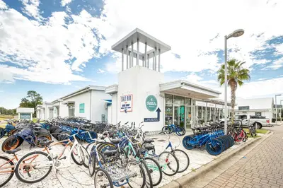 a bunch of bikes parked in front of a building at Prominence- 3 BR, steps to the resort style pool, Big Chill & Bikes in Santa Rosa Beach