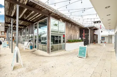 a store front with a sign in front of it at Prominence- 3 BR, steps to the resort style pool, Big Chill & Bikes in Santa Rosa Beach