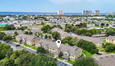 an aerial view of a residential neighborhood with houses at Bexley Blue in Panama City Beach
