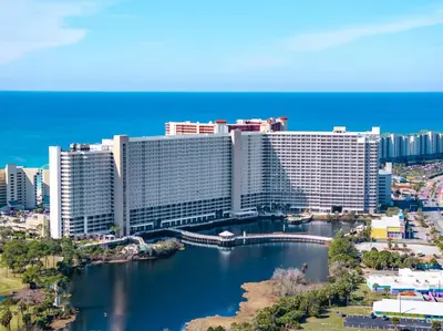 an aerial view of a large building next to a river at Laketown Wharf Resort by Panhandle Getaways in Panama City Beach