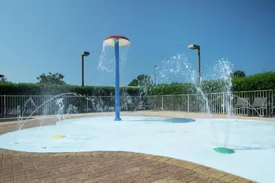 a fountain with water shooting up into the air at Hampton Inn & Suites Panama City Beach-Pier Park Area in Panama City Beach