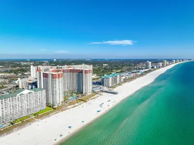 an aerial view of a beach with buildings and the ocean at Shores of Panama 2112 in Panama City Beach