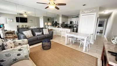a living room with a couch and a table at Southwind I-9 in Panama City Beach