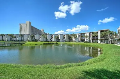 a large pond in front of a building at Sugar Beach C-2 in Panama City Beach