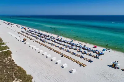 an overhead view of a beach with umbrellas and the ocean at Tidewater Beach Resort by Panhandle Getaways in Panama City Beach