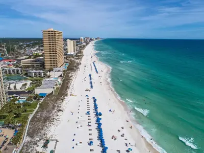 an aerial view of a beach and the ocean at The Summit Beach Resort By Panhandle Getaways in Panama City Beach