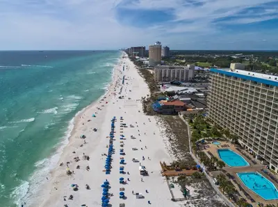 an aerial view of a beach and the ocean at The Summit Beach Resort By Panhandle Getaways in Panama City Beach