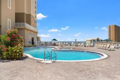 a swimming pool in the middle of a building at Grand Panama Beach Resort by Panhandle Getaways in Panama City Beach
