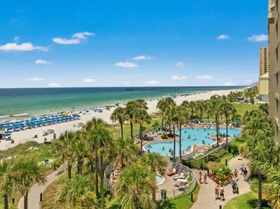 a view of the beach from the balcony of a resort at Grand Panama Beach Resort by Panhandle Getaways in Panama City Beach