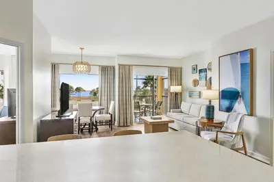 a living room with a couch and a table at Marriott's Legends Edge at Bay Point in Panama City Beach
