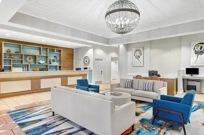 a living room with a couch and chairs at Marriott's Legends Edge at Bay Point in Panama City Beach