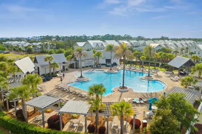 an aerial view of a pool at a resort at Prominence on 30A by Panhandle Getaways in Watersound Beach