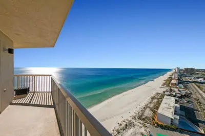 a view of the beach from the balcony of a condo at Sunrise Beach #2411 in Panama City Beach