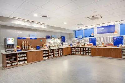 a store interior with a counter and a grocery store at Holiday Inn Express & Suites Panama City Beach - Beachfront by IHG in Panama City Beach
