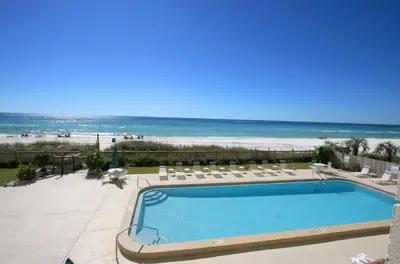 a view of a swimming pool and the beach at Mariner West 205 in Panama City Beach