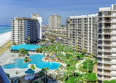 an aerial view of a resort with a pool and buildings at Edgewater Tower 2-611 in Panama City Beach
