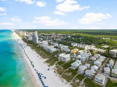 an aerial view of a beach with condos at 30A Beach House - Sanibel in Seagrove Beach