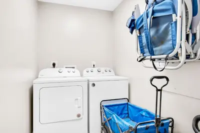 a laundry room with a washer and dryer at Ocean Reef 1708 in Panama City Beach