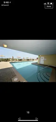 a picture of a swimming pool in a building at Ocean Ritz - Family Tides - sleeps 12 in Panama City Beach
