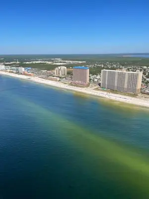an aerial view of a beach with buildings and the ocean at House 3 blocks to the beach in Panama City Beach