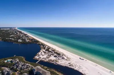 an aerial view of a beach and the ocean at Prominence Rentals on 30A by Panhandle Getaways in Watersound Beach