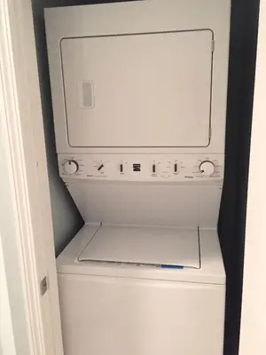 a white washer and dryer in a room at LAKETOWN 5 POOLs STEPS TO BEACH FAMILY FRIENDLY in Panama City Beach