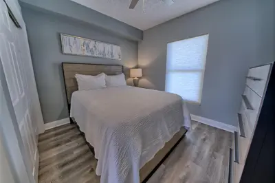 a bedroom with a large bed and a window at Gorgeous Condo with Breathtaking Ocean View - Unit 0803 in Panama City Beach