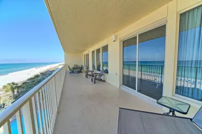 a balcony with a view of the beach at Roomy Condo with Pool and Beach Access - Unit 0502 in Panama City Beach