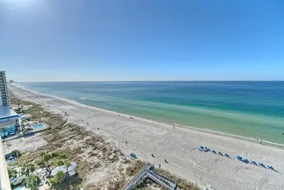 an aerial view of a beach and the ocean at Luxurious Beachfront Condo with Beachside Pool Access and Free WiFi - Unit 1202 in Panama City Beach