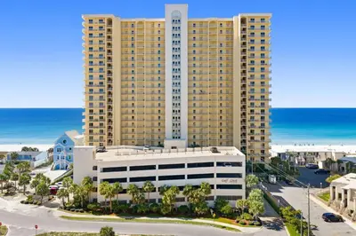 an aerial view of a hotel with the ocean in the background at Beautiful Condo with Spacious Balcony to Enjoy Fascinating Ocean View - Unit 1002 in Panama City Beach