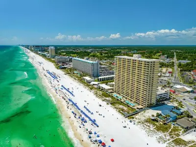 an aerial view of a beach with hotels and the ocean at Stunning 16th Floor Condo with Fitness Center, Hot Tubs, Pools, and Beach Access - Unit 1606 in Panama City Beach