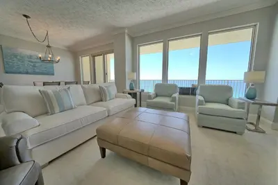a living room with a couch and two chairs at Gulf Front Condo with Beach Access and Beachside Pool - Unit 1604 in Panama City Beach