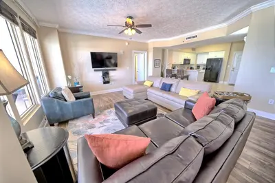 a large living room with a couch and chairs at Astonishing Oceanfront Condo with Oversized Balcony to Enjoy Amazing Gulf View - Unit 0204 in Panama City Beach