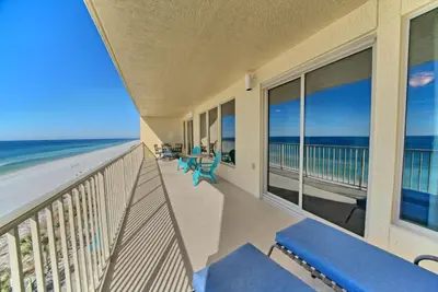 a balcony with a view of the ocean at Tropical Gulf Front Condo with Picnic Area & Grills - Unit 0802 in Panama City Beach