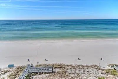 an aerial view of a beach with the ocean at Tropical Gulf Front Condo with Picnic Area & Grills - Unit 0802 in Panama City Beach